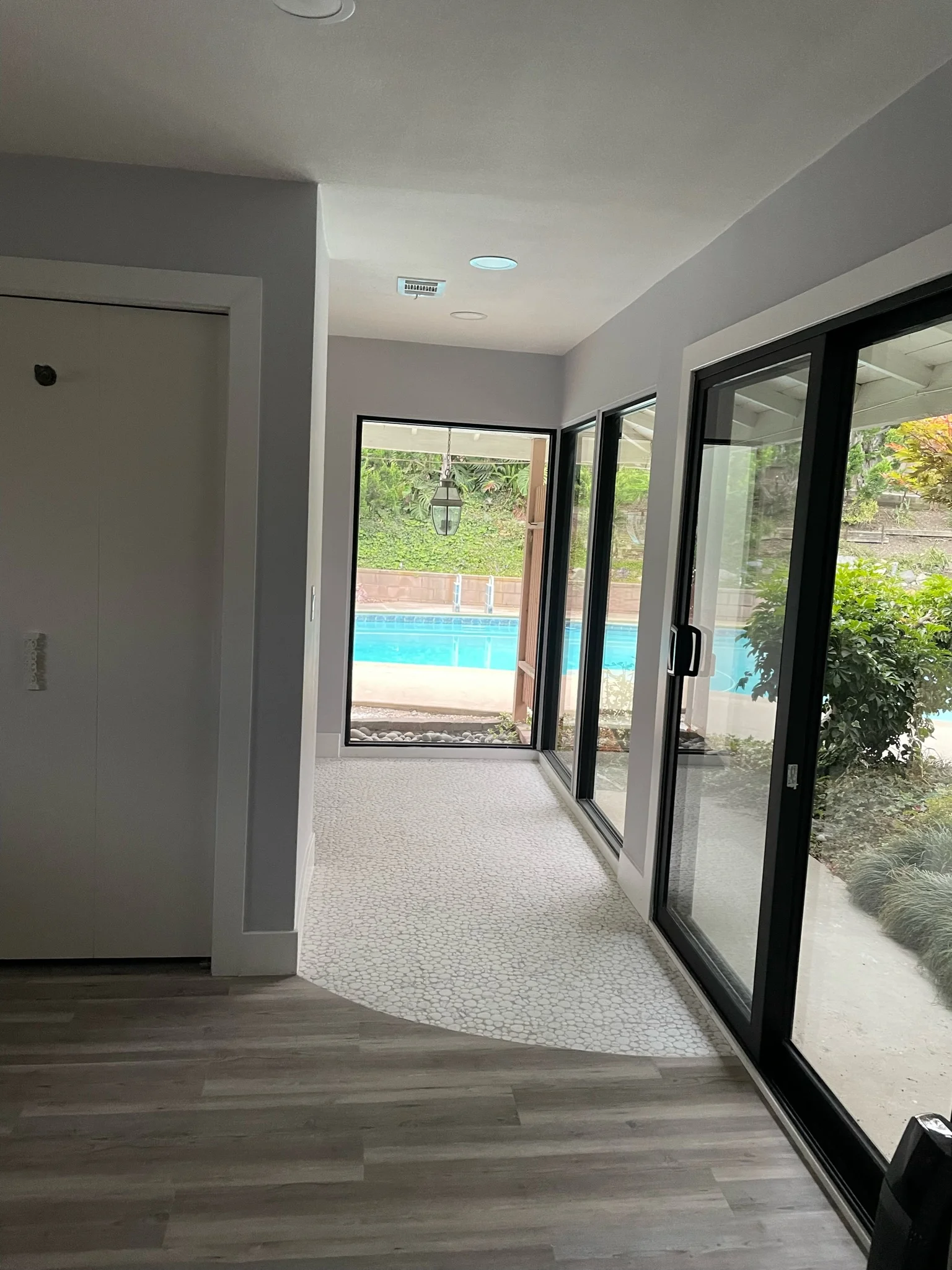 Exterior home improvements including new windows and fresh paint