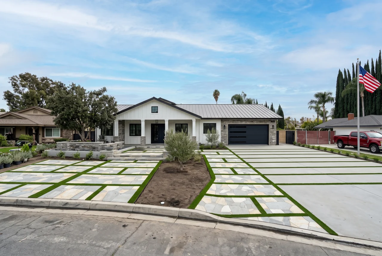 Remodeled single-story home with paver driveway built by Rehab Building Co. INC in Gardena